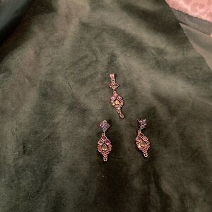 Earrings and matching necklace less chain